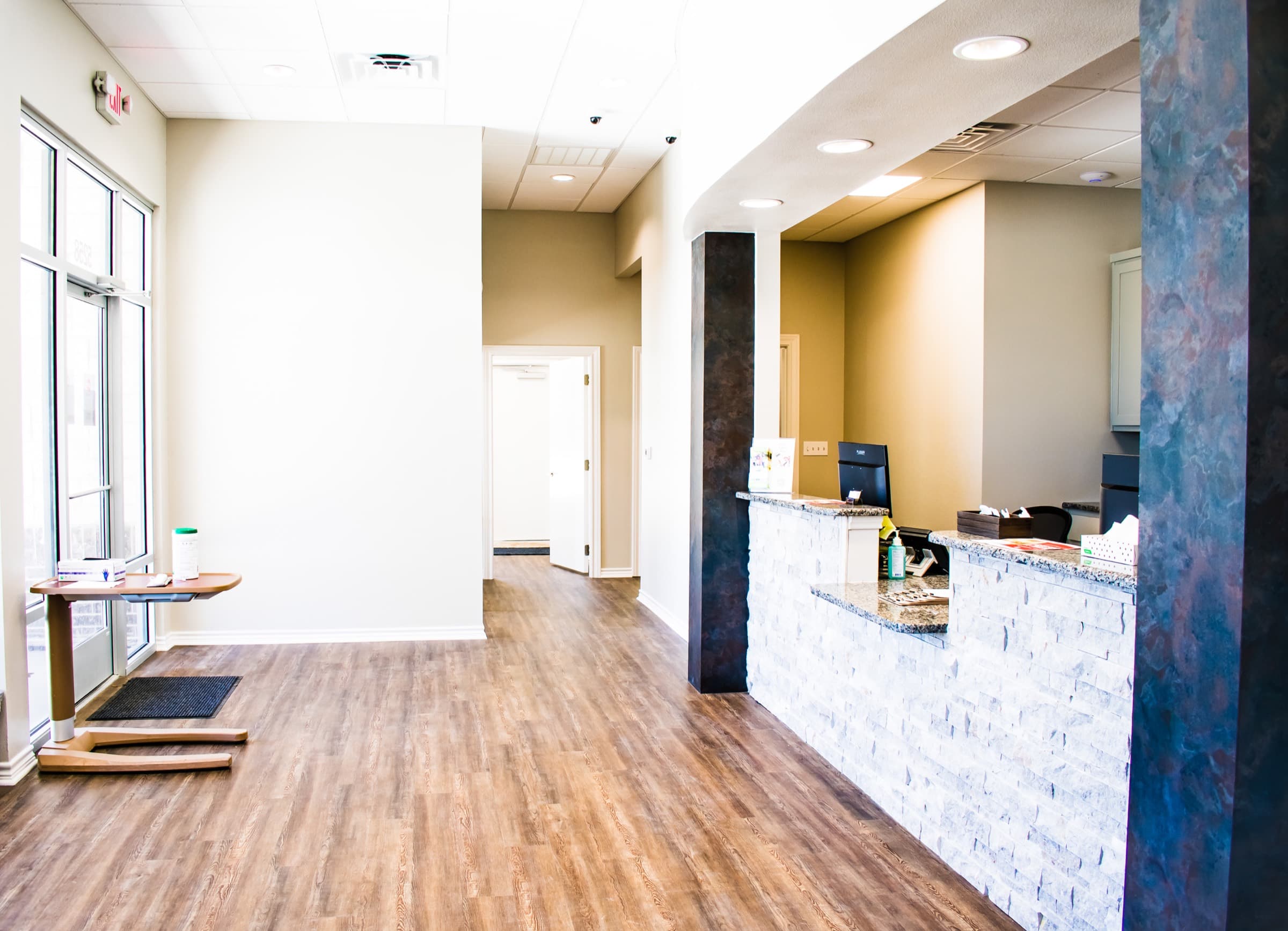 The interior of the Temple office, with wood floors and natural light