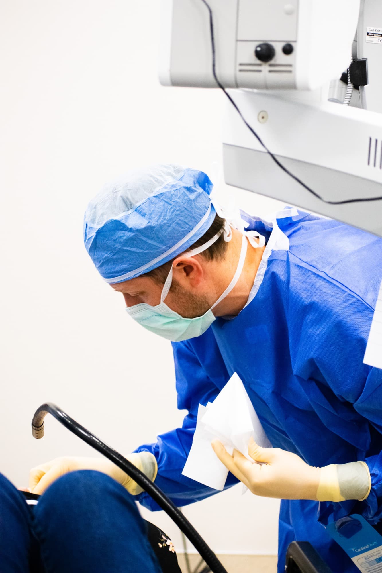A Texas Vision surgeon focused at work in the surgical suite