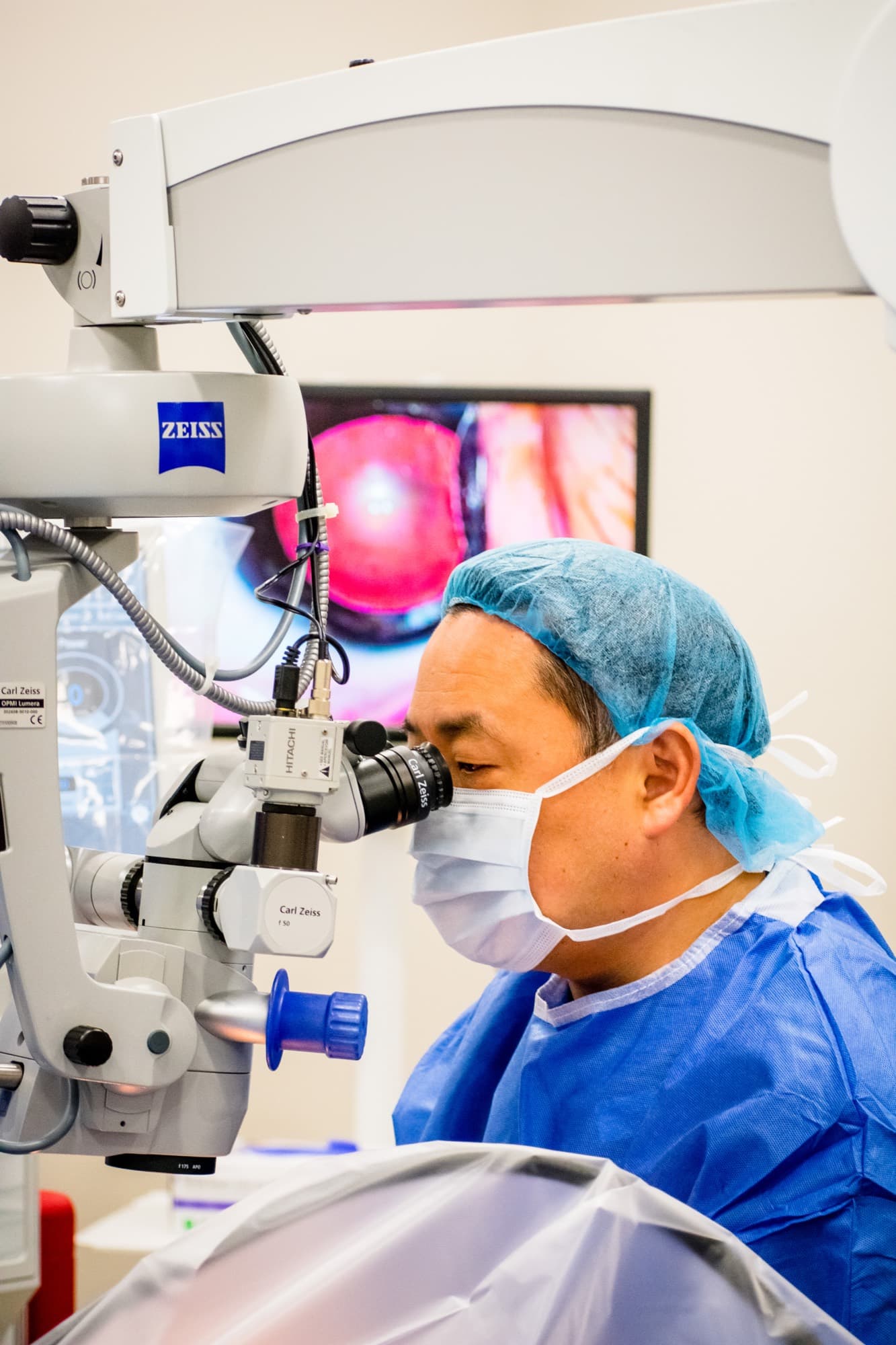 A Texas Vision surgeon operating through the microscope